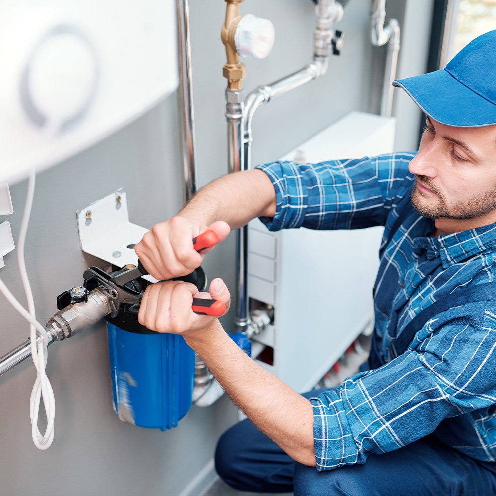 a plumber plumber Del Norte colorado fixing a bolier problem
