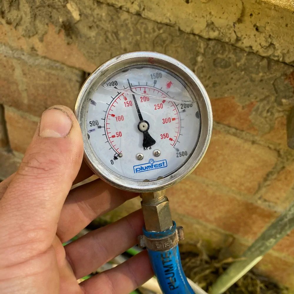 Plumber in Colorado performing Leak Detection inside a Del Norte home