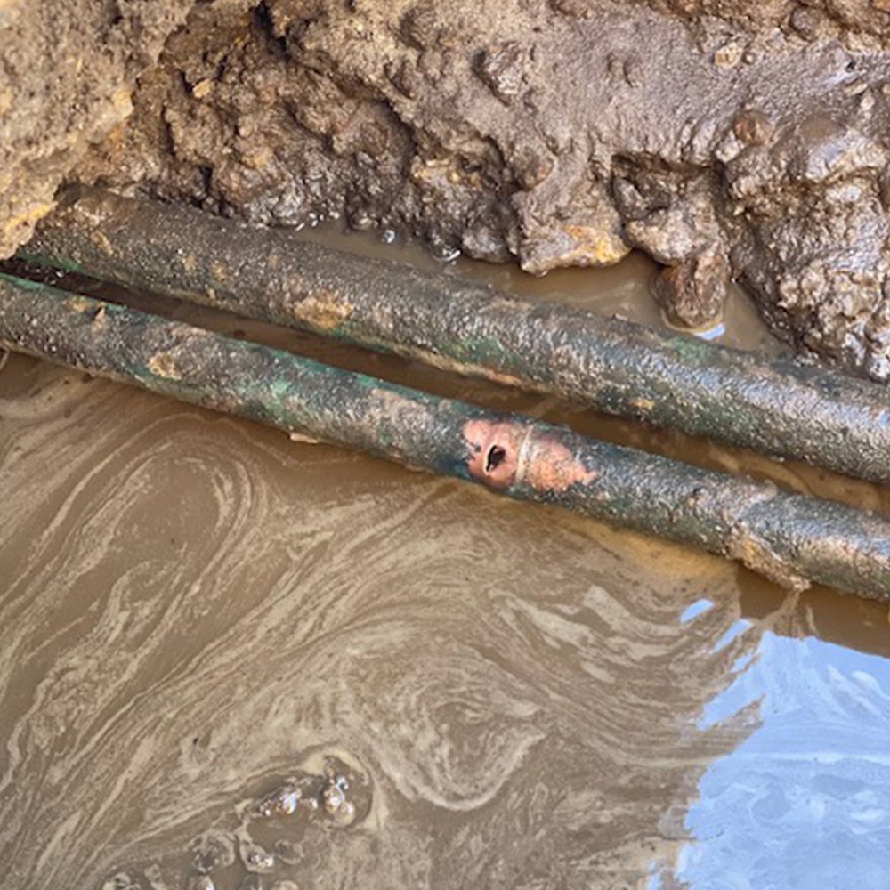 Trusted plumber in Colorado inspecting pipes for Leak Detection issues